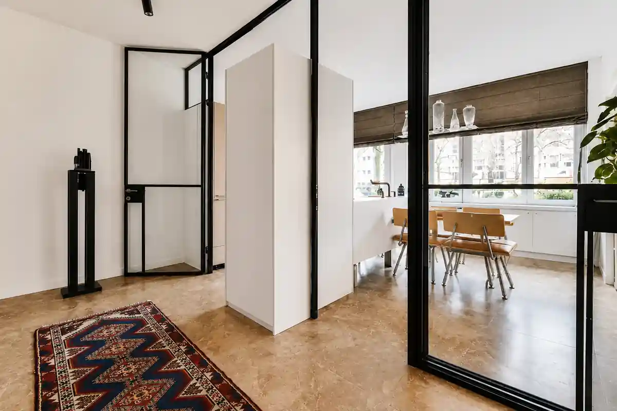 Partition between living and dining areas